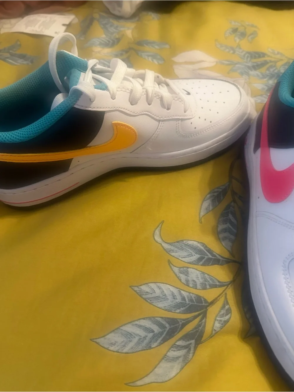 Nike Kids White Low-Top Sneakers with Teal and Pink Accents